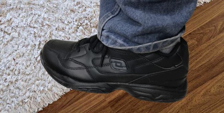  Wearing Skechers Felton Shoe for work in a black color