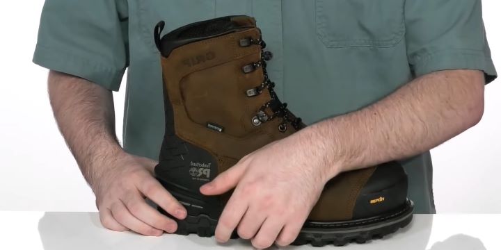 checking the outsole of the puncture-resistant boots