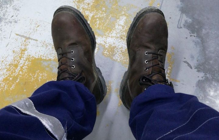 Wearing out the Timberland PRO work boots for standing all day in a brown color