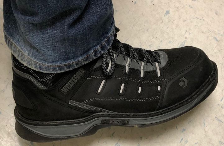 Using the durable black work boot from Wolverine