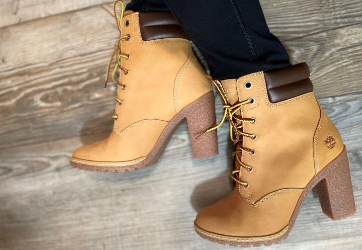 Using the stylish high heel work boots for men and women